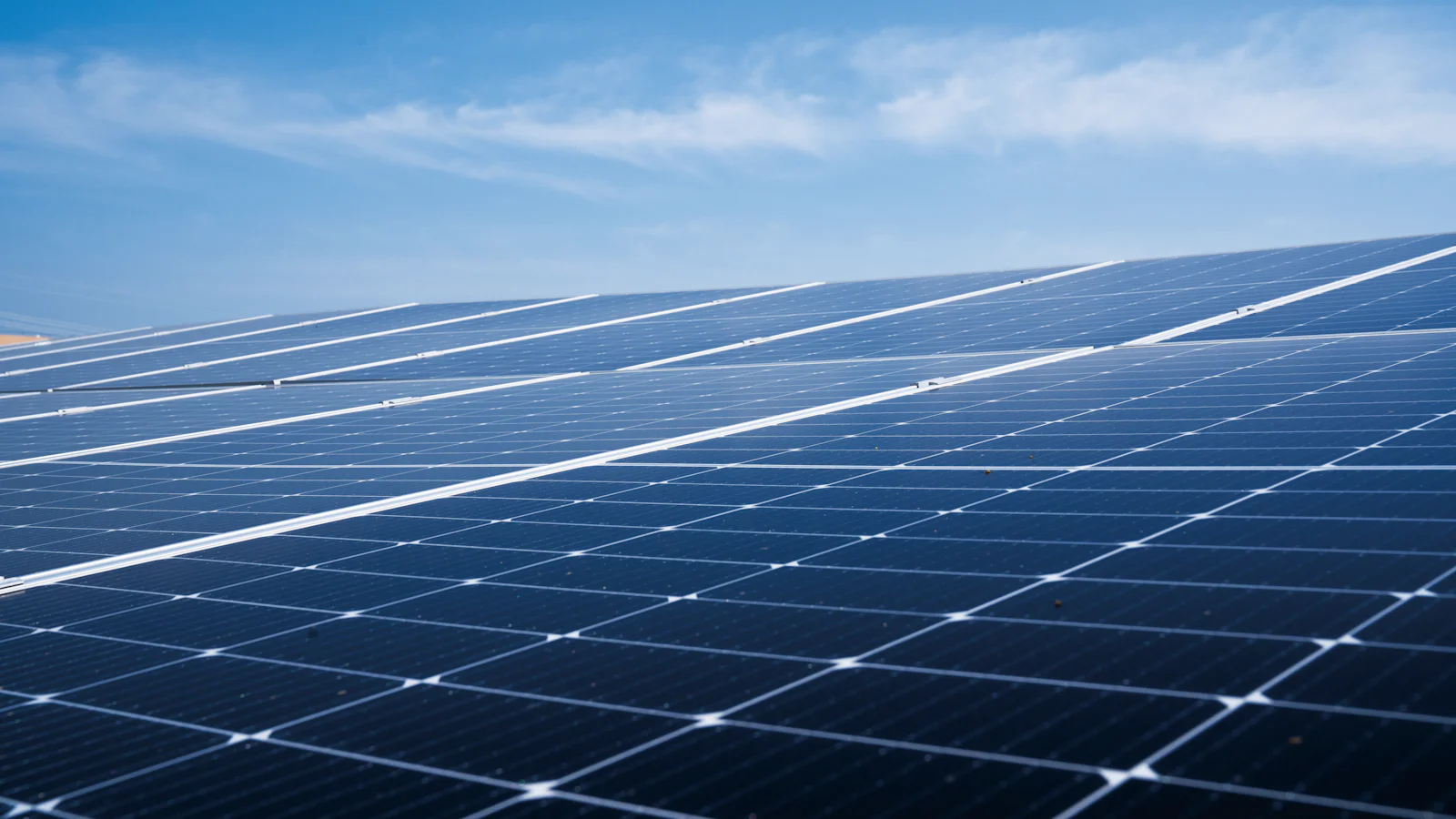 Solar panels under a blue sky